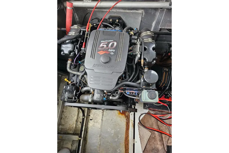 Slide: The Image of Engine compartment of a 2002 Sharpe 18x85 with MerCruiser 5.0 MPI engine. - 57