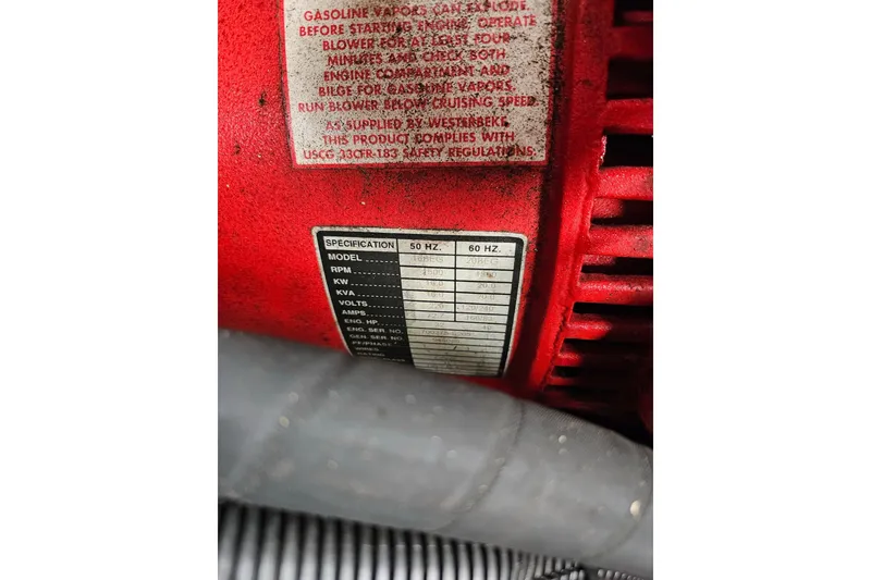 Slide: The Image of Red Sharpe 18x85 engine label with specifications, 2002 model. - 58