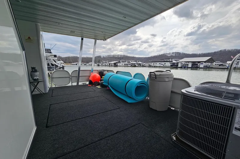 Slide: The Image of Covered deck of 2002 Sharpe 18x85 houseboat with lake view and equipment. - 63