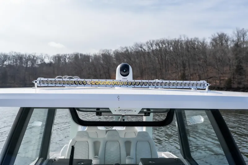 Slide: The Image of 2026 Fountain 43 SCX boat with advanced camera and light bar on roof. - 19
