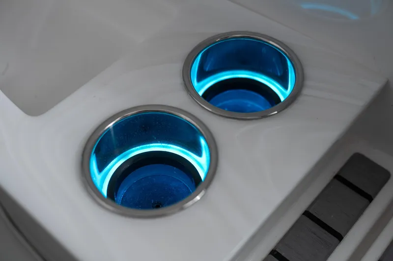 Slide: The Image of Illuminated cup holders on 2026 Fountain 43 SCX boat interior. - 21