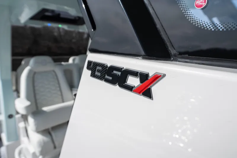 Slide: The Image of 2026 Fountain 43 SCX boat interior with logo detail. - 25