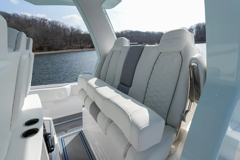 Slide: The Image of Luxurious interior seating of 2026 Fountain 43 SCX boat with lake view. - 30