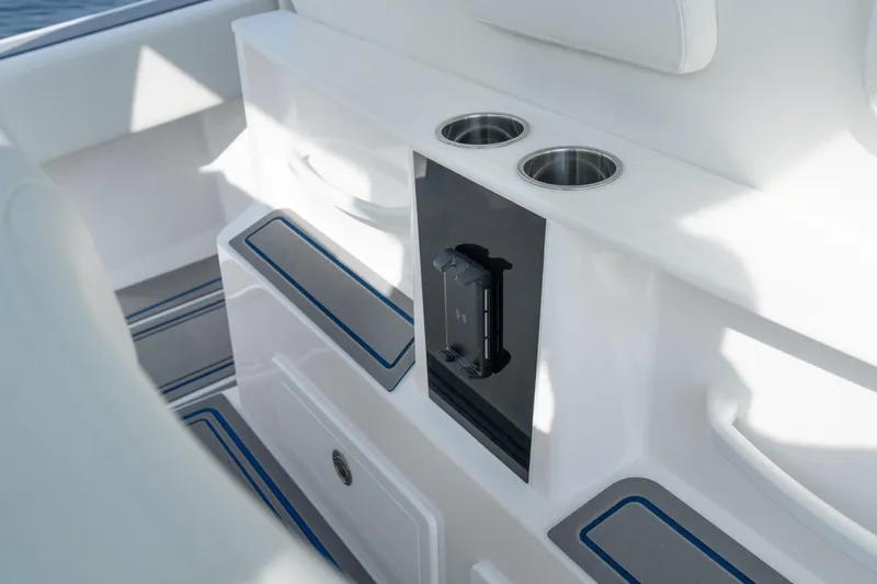 Slide: The Image of Interior of 2026 Fountain 43 SCX boat with cup holders and storage compartments. - 35