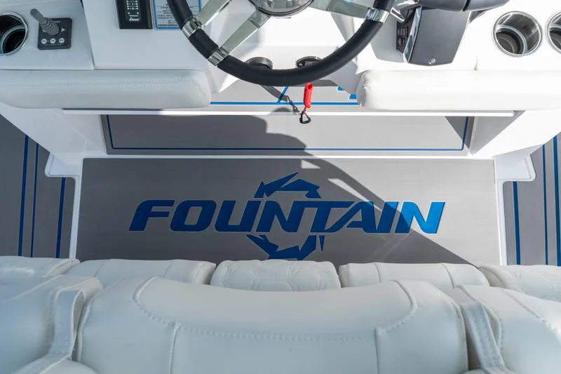 Slide: The Image of Interior view of 2026 Fountain 43 SCX boat cockpit with logo on floor mat. - 45