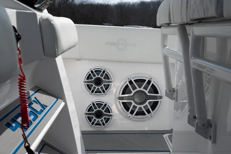 Slide: The Image of 2026 Fountain 43 SCX boat interior with speakers and seating detail. - 46