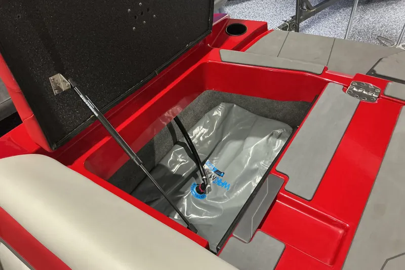 Slide: The Image of Open storage compartment in 2022 Axis T250 boat with ballast bag. - 17