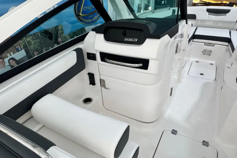 Slide: The Image of 2026 Robalo R277 Dual Console interior with sleek seating and modern design. - 3