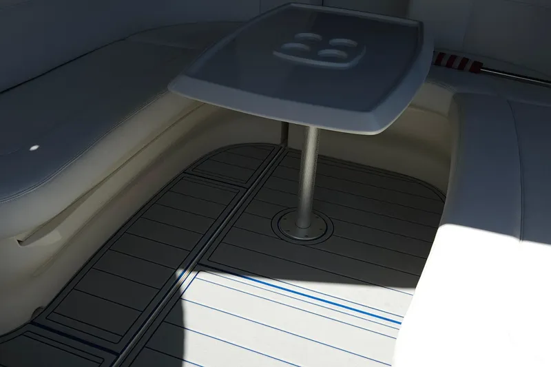 Slide: The Image of 2008 Sea Ray 40 Sundancer interior with cushioned seating and table. - 24