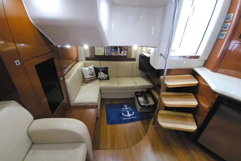 Slide: The Image of Luxurious interior of 2008 Sea Ray 40 Sundancer yacht with cozy seating and elegant wood finishes. - 26