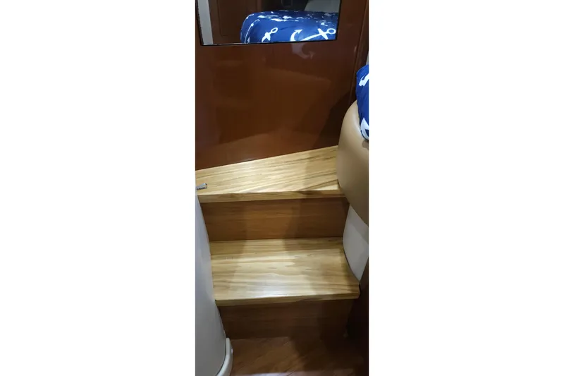 Slide: The Image of Interior wooden steps on a 2008 Sea Ray 40 Sundancer yacht. - 31