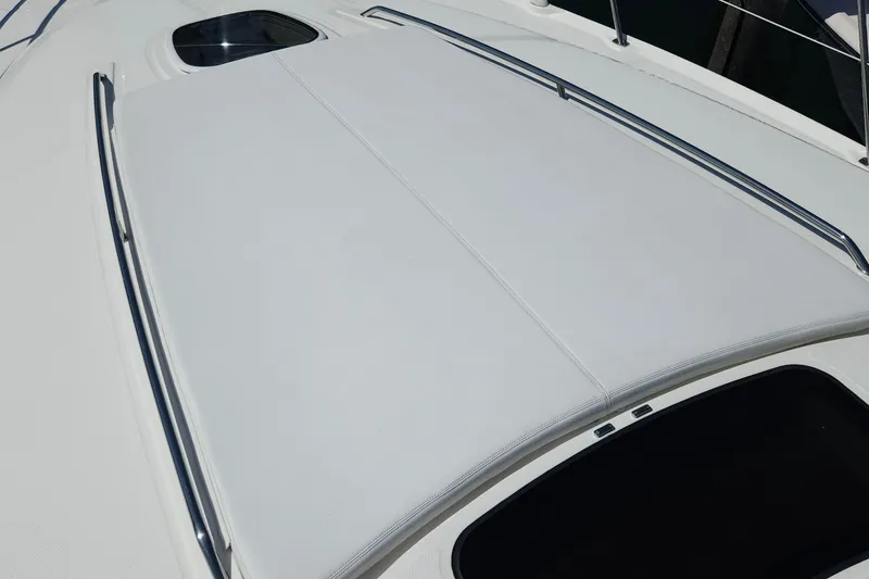 Slide: The Image of 2008 Sea Ray 40 Sundancer yacht deck with sleek design and sunroof. - 5
