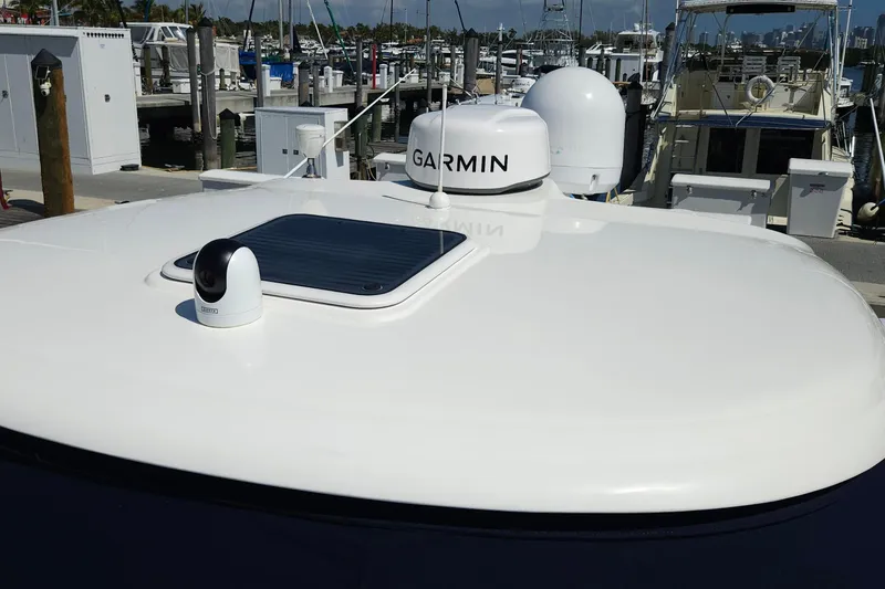 Slide: The Image of 2008 Sea Ray 40 Sundancer yacht with Garmin equipment at marina. - 7