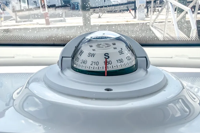 Slide: The Image of Compass on 2026 Tidewater 232 LXF boat, showing south direction. - 28