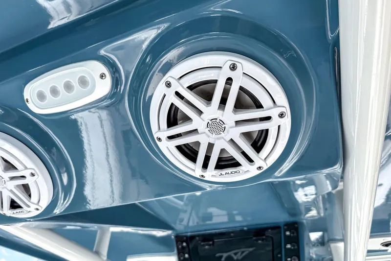 Slide: The Image of 2026 Tidewater 232 LXF boat speakers and controls, featuring JL Audio system. - 34
