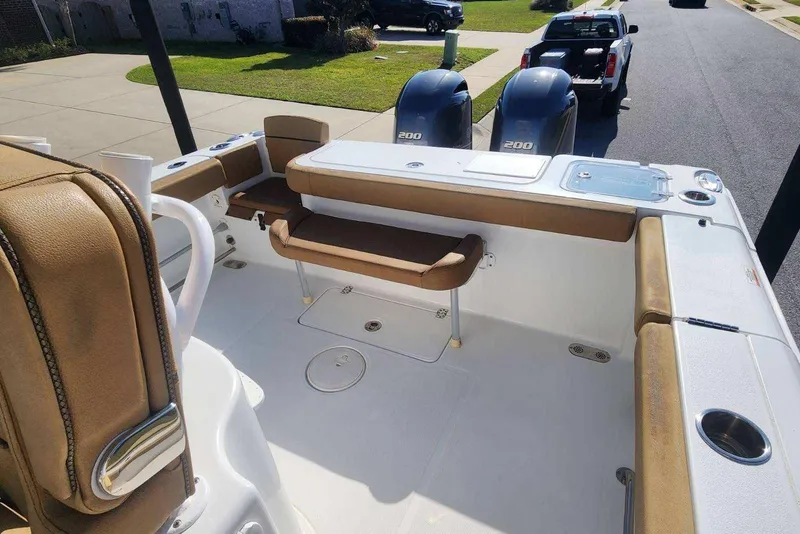 Slide: The Image of 2020 Sea Hunt Gamefish 27 boat with forward seating and twin engines. - 10