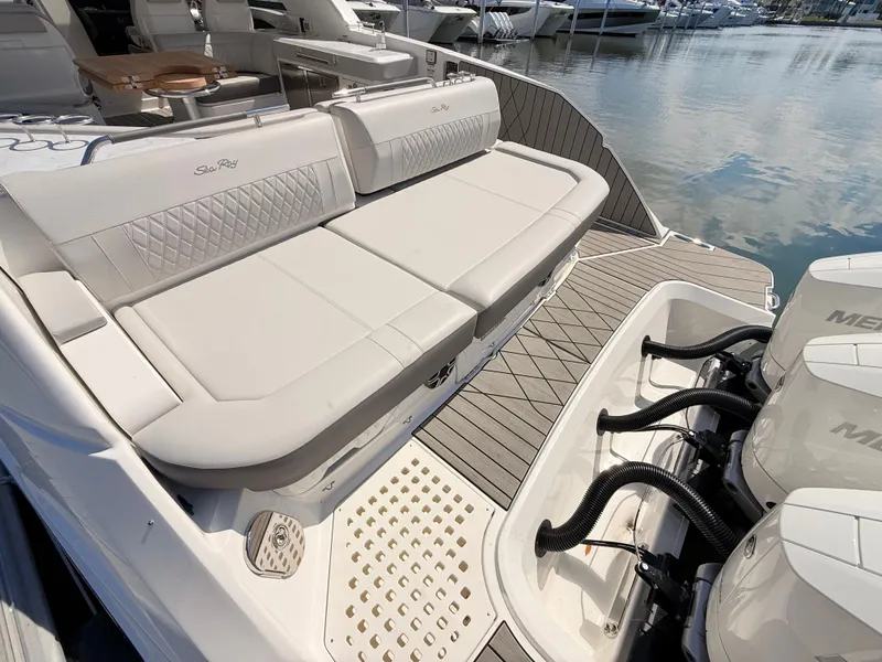 Slide: The Image of 2026 Sea Ray SLX 400 Outboard with luxurious seating and engines. - 28