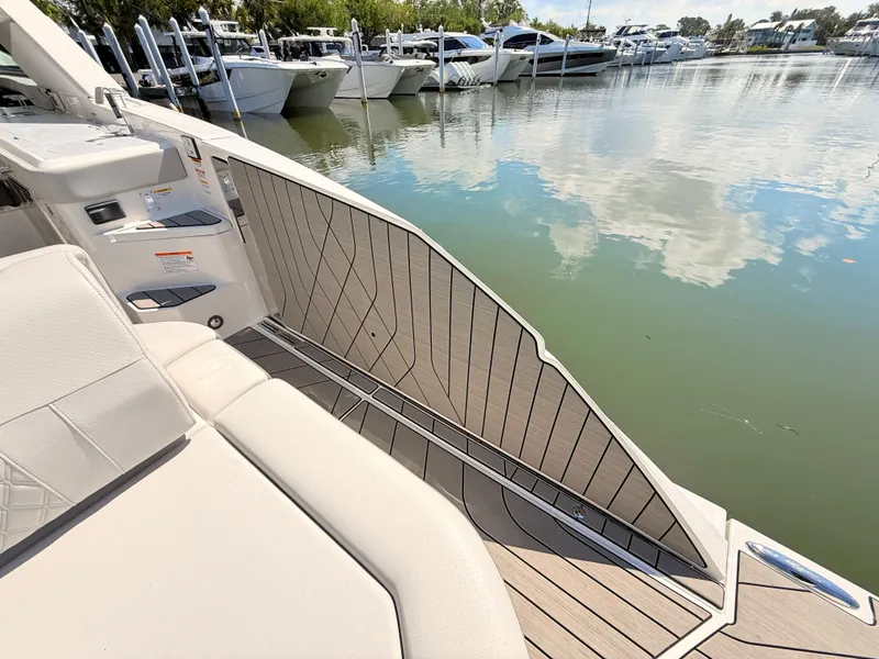 Slide: The Image of Interior view of 2026 Sea Ray SLX 400 Outboard at dock. - 32