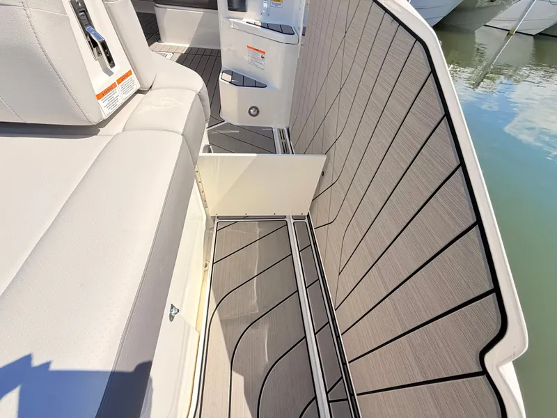 Slide: The Image of Interior of 2026 Sea Ray SLX 400 Outboard with sleek seating. - 35
