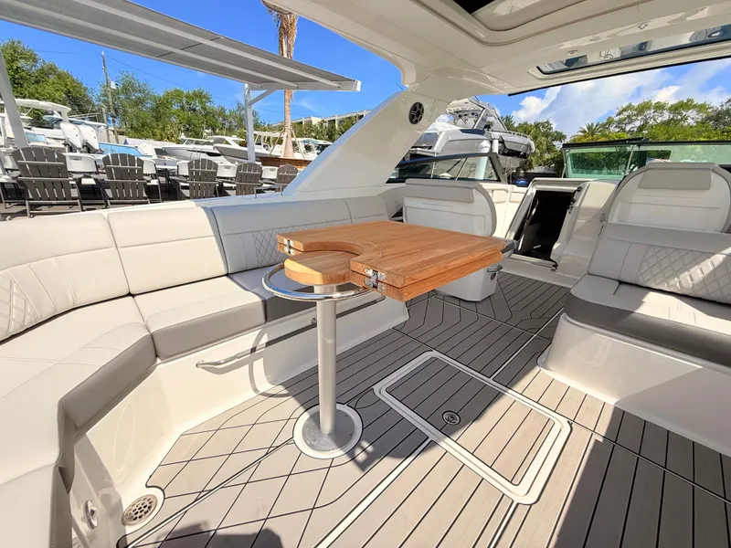 Slide: The Image of Interior of 2026 Sea Ray SLX 400 Outboard with luxurious seating area. - 39