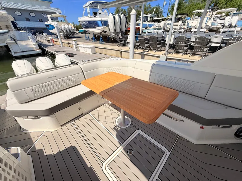 Slide: The Image of Interior of 2026 Sea Ray SLX 400 Outboard with elegant seating area. - 40