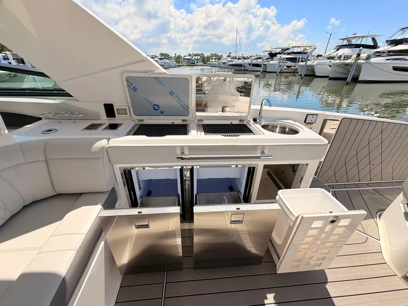 Slide: The Image of Luxurious kitchen on Sea Ray SLX 400 Outboard 2026 yacht. - 43