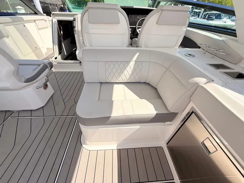 Slide: The Image of Interior of 2026 Sea Ray SLX 400 Outboard with luxurious seating. - 48