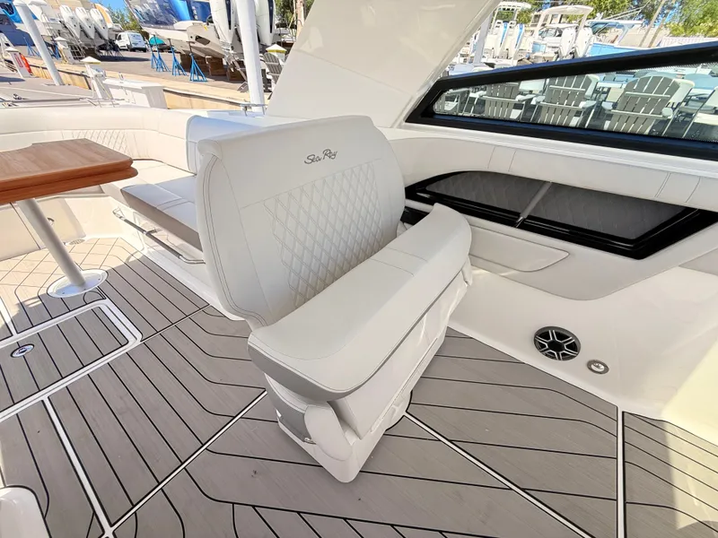 Slide: The Image of Interior of 2026 Sea Ray SLX 400 Outboard with luxurious seating. - 54