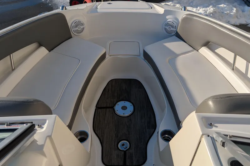 Slide: The Image of 2011 Sea Ray 240 Sundeck interior with spacious seating and modern design. - 17