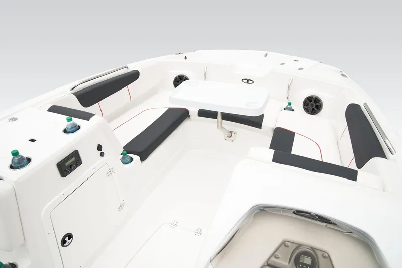 Slide: The Image of Manufacturer Provided Image: 2025 Tahoe 2150 boat interior with seating, table, and speakers. - 32