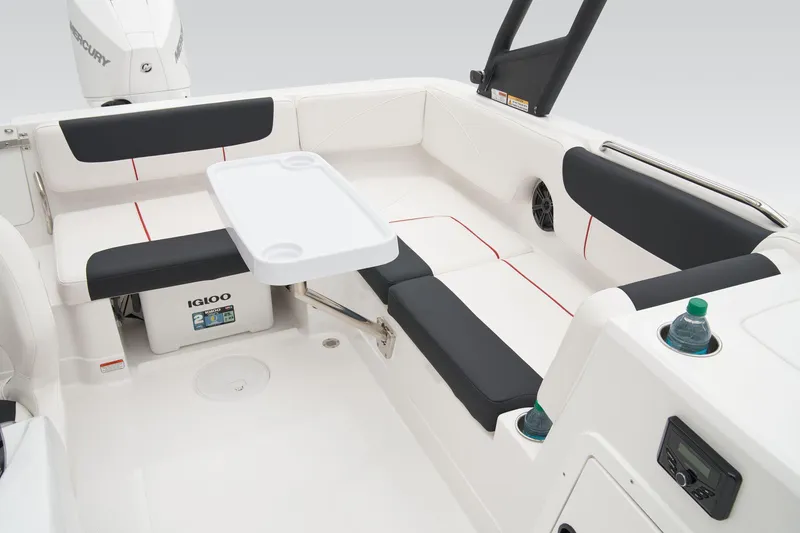 Slide: The Image of Manufacturer Provided Image: 2025 Tahoe 2150 boat interior with seating, table, and cup holders. - 36