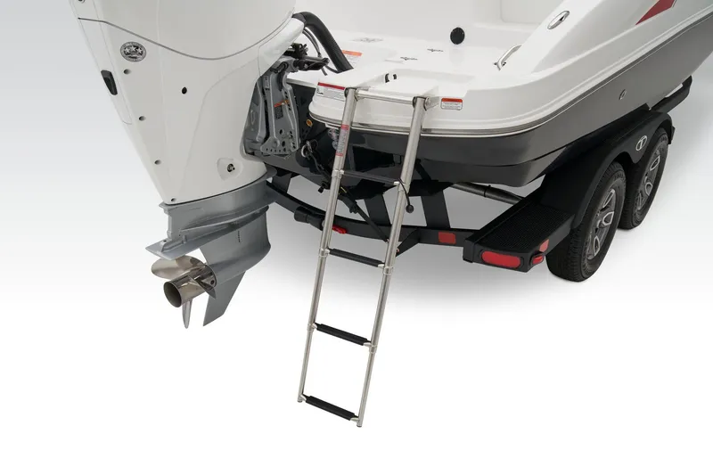 Slide: The Image of Manufacturer Provided Image: 2025 Tahoe 2150 boat with ladder and trailer, showcasing engine and rear design. - 39