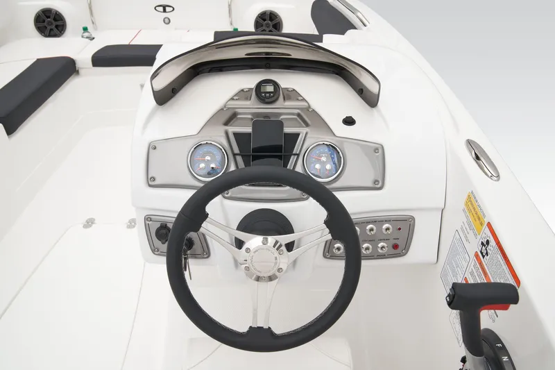 Slide: The Image of Manufacturer Provided Image: 2025 Tahoe 2150 boat dashboard with steering wheel and control panel. - 46