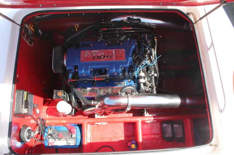 Slide: The Image of Engine compartment of 2004 Spectre 36 Cat with high-performance components. - 13
