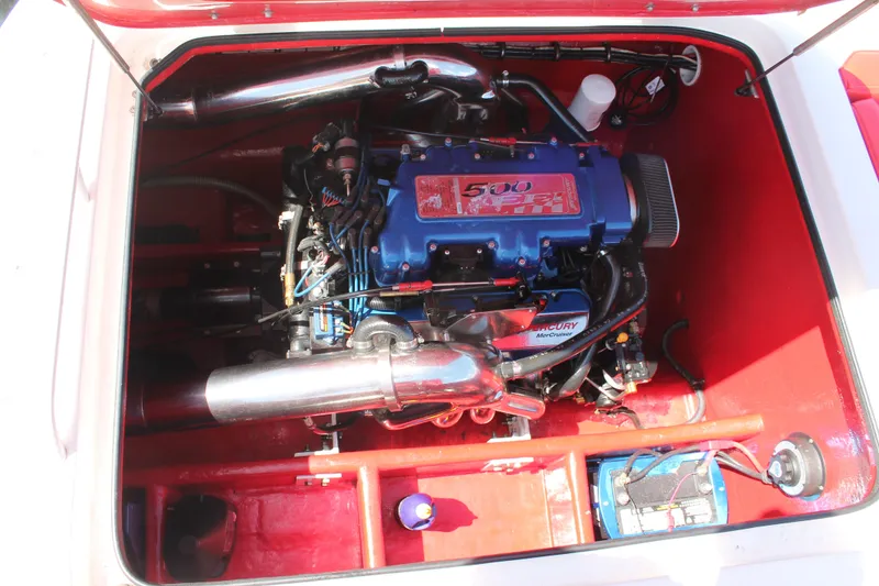 Slide: The Image of 2004 Spectre 36 Cat engine compartment with Mercury MerCruiser 500 EFI engine. - 14