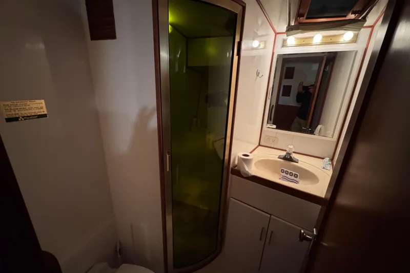 Slide: The Image of Bathroom interior of 1989 Dyna Craft 45 yacht with shower and sink. - 32