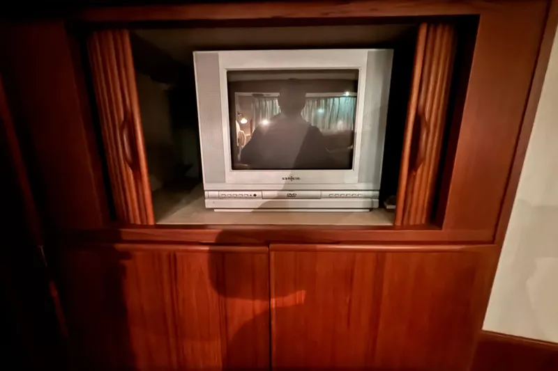 Slide: The Image of Vintage TV in wooden cabinet on 1989 Dyna Craft 45 yacht. - 41
