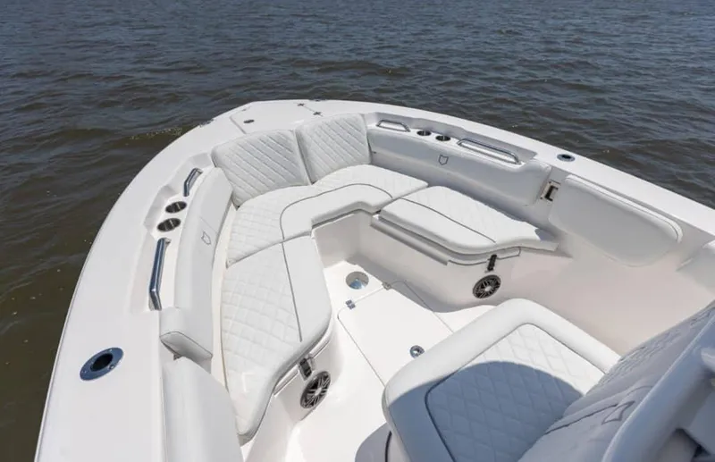 Slide: The Image of Manufacturer Provided Image: 2024 Sea Fox 228 Commander boat with luxurious white seating on the water. - 6