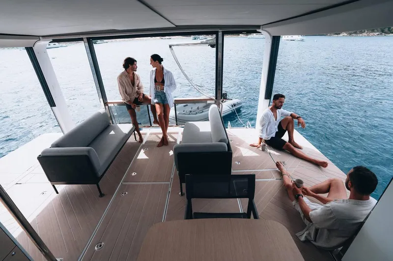 Slide: The Image of Manufacturer Provided Image: People relaxing on Jeanneau Sea Loft 480 yacht, 2026 model, with ocean view. - 6