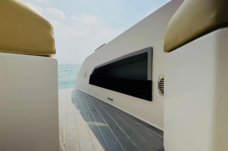 Slide: The Image of 2023 Rio Yachts Daytona 34 deck view with ocean backdrop. - 12