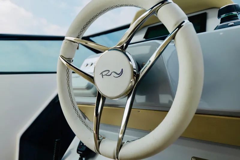 Slide: The Image of Steering wheel of 2023 Rio Yachts Daytona 34, featuring elegant design and craftsmanship. - 23