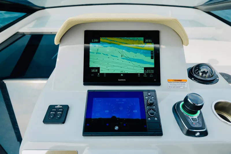 Slide: The Image of Cockpit navigation system of 2023 Rio Yachts Daytona 34 with Garmin display. - 24