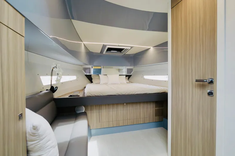 Slide: The Image of Luxurious interior of 2023 Rio Yachts Daytona 34, featuring a modern bedroom design. - 32