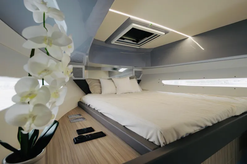 Slide: The Image of Luxurious interior of 2023 Rio Yachts Daytona 34 with elegant bedding and decor. - 33