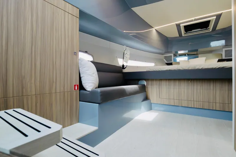 Slide: The Image of Luxurious interior of 2023 Rio Yachts Daytona 34, featuring modern wood and leather finishes. - 37