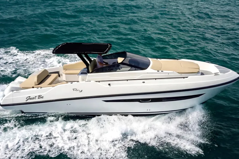 Slide: The Image of 2023 Rio Yachts Daytona 34 cruising on open water, showcasing sleek design and luxury features. - 6