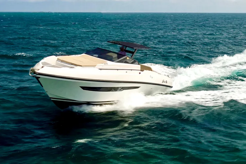 Slide: The Image of 2023 Rio Yachts Daytona 34 cruising on open sea, showcasing sleek design and performance. - 7