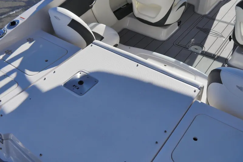 Slide: The Image of 2023 Chaparral 21 SSi Ski & Fish OB interior with seating and deck features. - 5