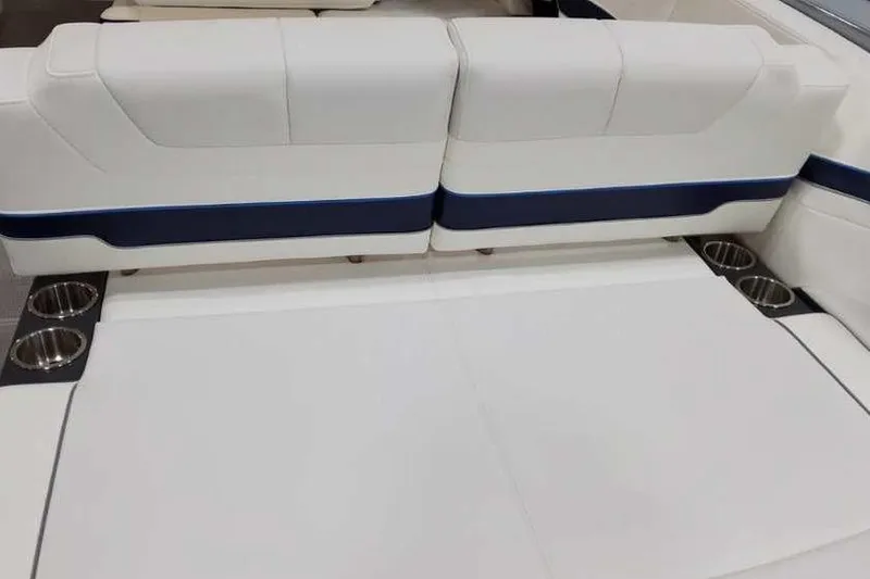 Slide: The Image of 2023 Formula 380 Super Sport Crossover OB interior seating with cup holders. - 12