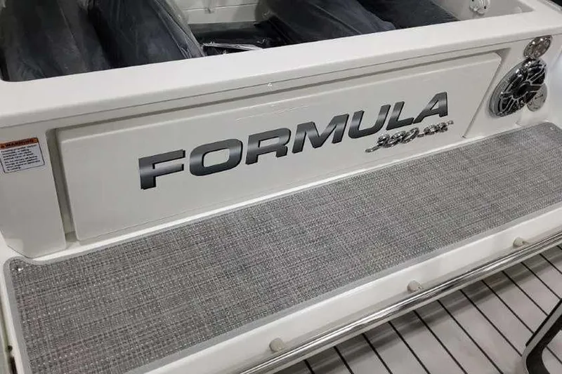 Slide: The Image of 2023 Formula 380 Super Sport Crossover OB boat, rear view with logo and speaker. - 14